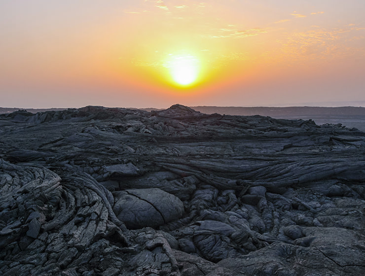 Sunrise above the solidified lava rock at Erta Ale volcano in Danakil Depression, Ethiopia, the hottest place on Earth, photo by Ivan Kralj