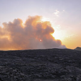 Sunrise behind the smoke of Erta Ale volcano in Danakil Depression, Ethiopia, the hottest place on Earth, photo by Ivan Kralj