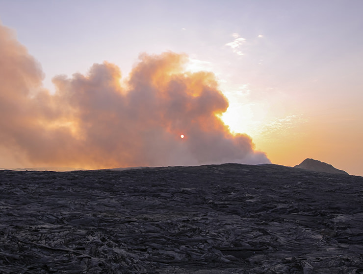 Sunrise behind the smoke of Erta Ale volcano in Danakil Depression, Ethiopia, the hottest place on Earth, photo by Ivan Kralj