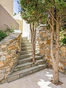 Trees growing in the outdoor staircase at Syra Suites, Syros island, Greece, copyright Syra Suites