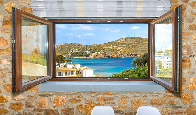 Turquoise Aegean Sea at Achladi Beach as seen through the window of Syra Suites in Syros, Greece, copyright Syros Suites