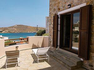 Sea view from the sunbeds at the terrace of one of Syra Suites, on Syros island, Greece, photo by Ivan Kralj