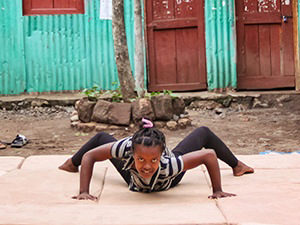 A contortionist from Arba Minch Circus twists her upper body like an owl would twist its head, photo by Ivan Kralj