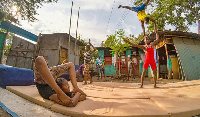 Street kids training contortion and acrobatics in the courtyard of Arba Minch Circus, social circus in Ethiopia, photo by Ivan Kralj