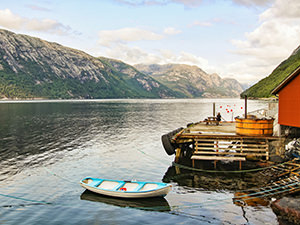 A boat in the Lysefjord and hot tub at the dock of Flørli 4444, home to the longest staircase in the world, photo by Ivan Kralj