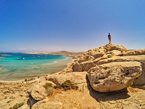 The view of Naoussa Bay from the Koukounaries hill, with Pipeaway blogger Ivan Kralj standing on the top, photo by Mladen Koncar