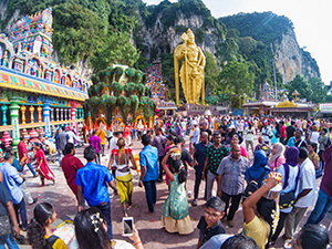 Pilgrims and tourists flocking to Batu Caves, the place of Thaipusam Festival 2019, celebrating Lord Murugan whose enormous golden statue stands just next to the 272 stairs leading to the cave temples, photo by Ivan Kralj