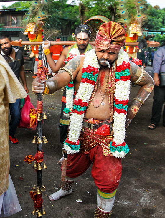 Devotee with a cigar at Thaipusam Festival 2019 at Batu Caves, Malaysia, photo by Ivan Kralj