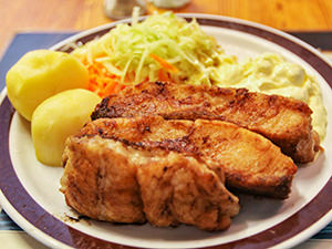 Codfish with potatoes and apple and carrot salad served in Bjellands Kjokken in Bergen, Norway, the rainiest city in Europe, photo by Ivan Kralj