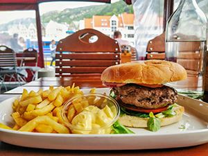 Whale burger with French fries at Fish Me restaurant in Bergen, Norway, photo by Ivan Kralj