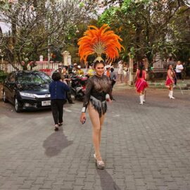 Ladyboy with a feathered headpiece at Chiang Mai Pride, gay parade in Chiang Mai, Thailand, photo by Ivan Kralj