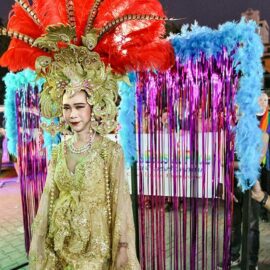 Ladyboy participant posing in an extravagant dress at Chiang Mai Pride, gay parade in Chiang Mai, Thailand, photo by Ivan Kralj