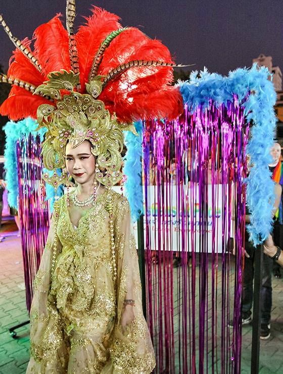 Ladyboy participant posing in an extravagant dress at Chiang Mai Pride, gay parade in Chiang Mai, Thailand, photo by Ivan Kralj