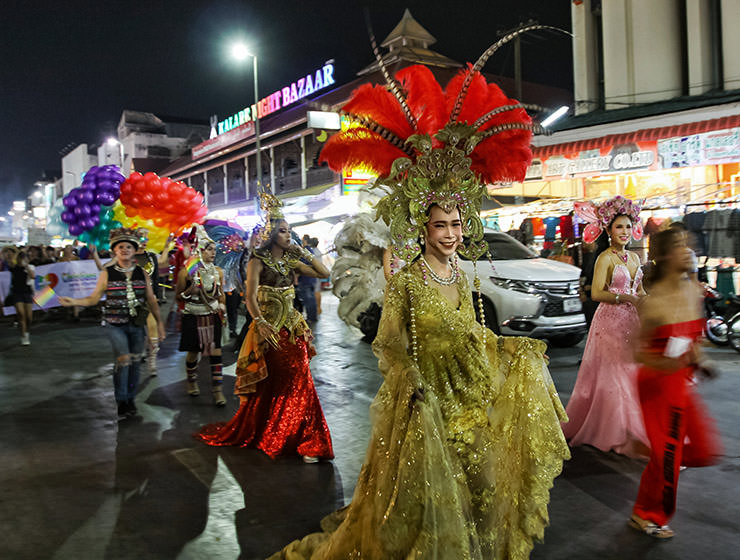 Ladyboy in an extravagant gown marching at Chiang Mai Pride, gay parade in Chiang Mai, Thailand, photo by Ivan Kralj