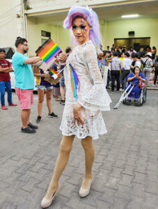 Young ladyboy with rainbow colored tears posing at Chiang Mai Pride, gay parade in Chiang Mai, Thailand, photo by Ivan Kralj