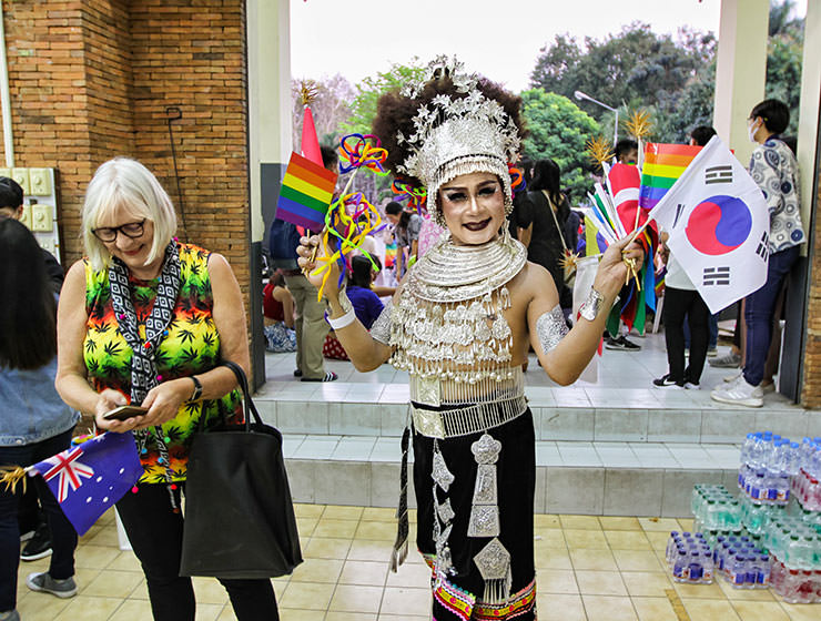 Participant in silver outfit posing at Chiang Mai Pride, gay parade in Chiang Mai, Thailand, photo by Ivan Kralj