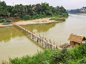 Bamboo bridge over the Nam Khan River in Luang Prabang, Laos, photo by Ivan Kralj