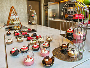 Cakes displayed in the Executive Lounge of Crowne Plaza Hotel in Vientiane, Laos, photo by Ivan Kralj