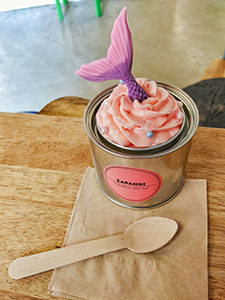 Pink fish tail sticking out of the Mermaid Cake served in a tin can, a specialty dessert of Zapangi, one of the best dessert cafes in Seoul, South Korea, photo by Ivan Kralj