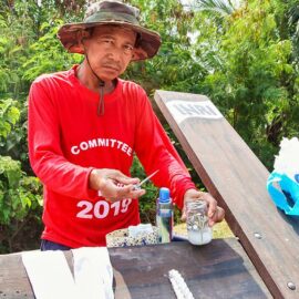 Member of the organising committee showing the nails that will be used in the crucifixion in Pampanga, San Fernando, the baray of San Juan, which is one of the highlights of the Maleldo 2019, Holy Week Philippines, photo by Ivan Kralj