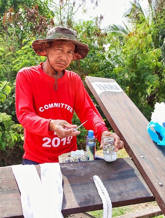 Member of the organising committee showing the nails that will be used in the crucifixion in Pampanga, San Fernando, the baray of San Juan, which is one of the highlights of the Maleldo 2019, Holy Week Philippines, photo by Ivan Kralj