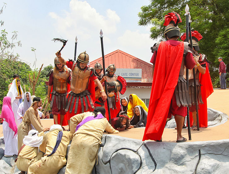 The crucifixion in Pampanga, San Fernando, is the highlight of the Maleldo 2019, Holy Week Philippines, here Roman soldier hitting a woman who tried to help Jesus Christ before crucifixion in Santa Lucia, photo by Ivan Kralj