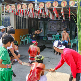 Magdarame devotees relive Christ's passion by carrying heavy crosses and flagellating themselves in San Fernando, Pampanga, during the Maleldo 2019, Holy Week Philippines, photo by Ivan Kralj
