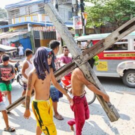 Magdarame devotees relive Christ's passion by carrying heavy crosses and flagellating themselves in San Fernando, Pampanga, during the Maleldo 2019, Holy Week Philippines, photo by Ivan Kralj