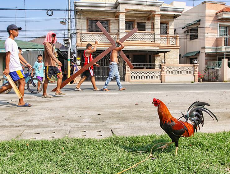 Magdarame devotees relive Christ's passion by carrying heavy crosses and flagellating themselves in San Fernando, Pampanga, during the Maleldo 2019, Holy Week Philippines, photo by Ivan Kralj