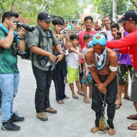 Magdarame devotees relive Christ's passion by carrying heavy crosses and flagellating themselves in San Fernando, Pampanga, during the Maleldo 2019, Holy Week Philippines, photo by Ivan Kralj