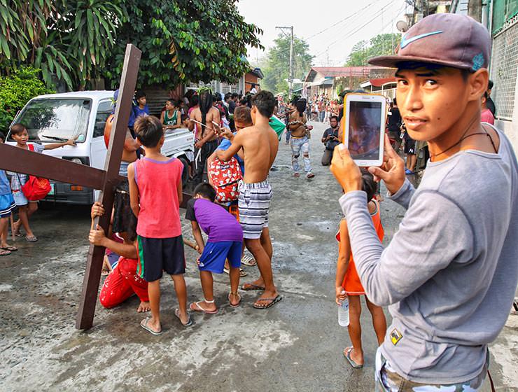 Magdarame devotees relive Christ's passion by carrying heavy crosses and flagellating themselves in San Fernando, Pampanga, during the Maleldo 2019, Holy Week Philippines, photo by Ivan Kralj