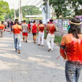 Magdarame devotees relive Christ's passion by carrying heavy crosses and flagellating themselves in San Fernando, Pampanga, during the Maleldo 2019, Holy Week Philippines, photo by Ivan Kralj