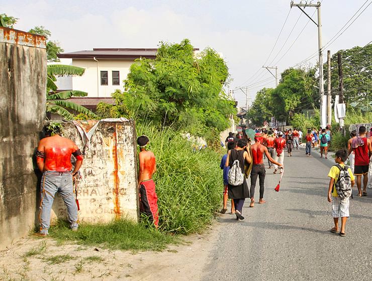Magdarame devotees relive Christ's passion by carrying heavy crosses and flagellating themselves in San Fernando, Pampanga, during the Maleldo 2019, Holy Week Philippines, photo by Ivan Kralj
