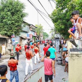 Magdarame devotees relive Christ's passion by carrying heavy crosses and flagellating themselves in San Fernando, Pampanga, during the Maleldo 2019, Holy Week Philippines, photo by Ivan Kralj