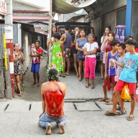 Magdarame devotees relive Christ's passion by carrying heavy crosses and flagellating themselves in San Fernando, Pampanga, during the Maleldo 2019, Holy Week Philippines, photo by Ivan Kralj