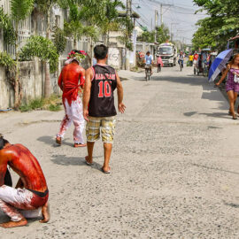 Magdarame devotees relive Christ's passion by carrying heavy crosses and flagellating themselves in San Fernando, Pampanga, during the Maleldo 2019, Holy Week Philippines, photo by Ivan Kralj