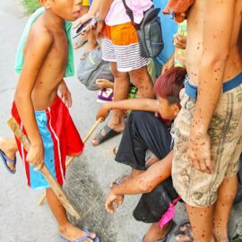 Kids covered in blood in the streets of San Fernando. Magdarame devotees relive Christ's passion by carrying heavy crosses and flagellating themselves in San Fernando, Pampanga, during the Maleldo 2019, Holy Week Philippines, photo by Ivan Kralj