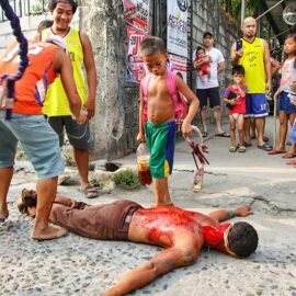 Magdarame devotees relive Christ's passion by carrying heavy crosses and flagellating themselves in San Fernando, Pampanga, during the Maleldo 2019, Holy Week Philippines, photo by Ivan Kralj