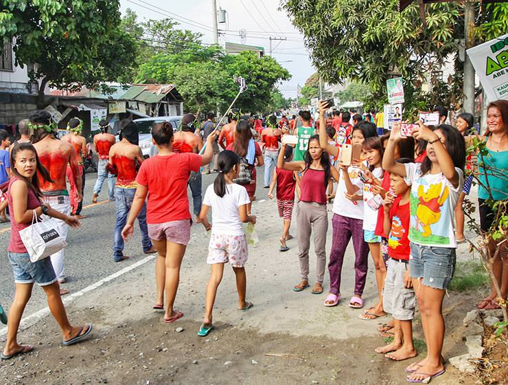 Magdarame devotees relive Christ's passion by carrying heavy crosses and flagellating themselves in San Fernando, Pampanga, during the Maleldo 2019, Holy Week Philippines, photo by Ivan Kralj