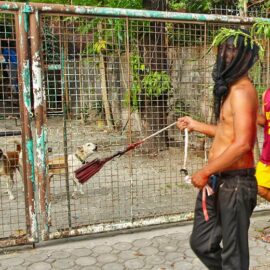 Magdarame devotees relive Christ's passion by carrying heavy crosses and flagellating themselves in San Fernando, Pampanga, during the Maleldo 2019, Holy Week Philippines, photo by Ivan Kralj