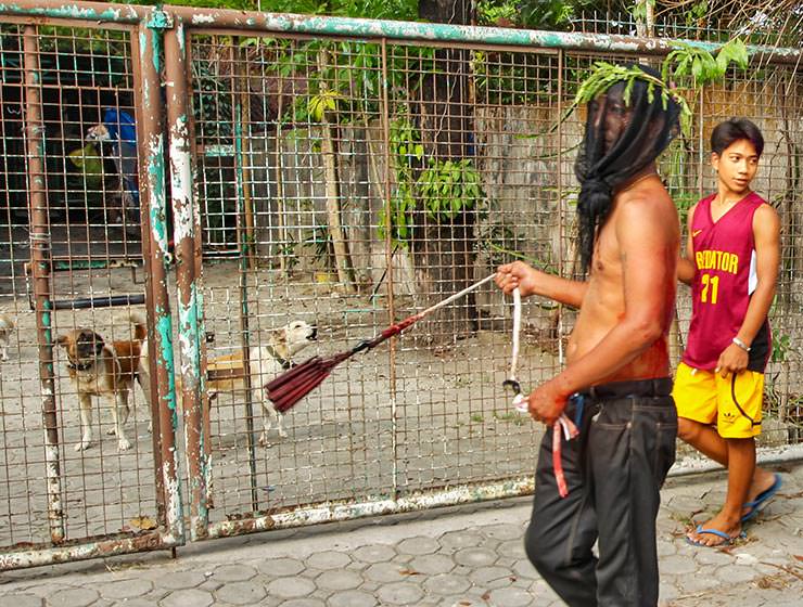 Magdarame devotees relive Christ's passion by carrying heavy crosses and flagellating themselves in San Fernando, Pampanga, during the Maleldo 2019, Holy Week Philippines, photo by Ivan Kralj