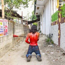 Magdarame devotees relive Christ's passion by carrying heavy crosses and flagellating themselves in San Fernando, Pampanga, during the Maleldo 2019, Holy Week Philippines, photo by Ivan Kralj