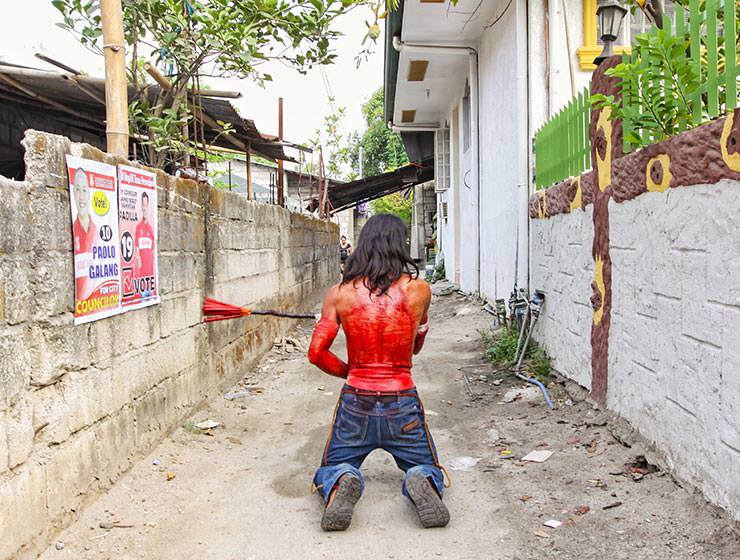 Magdarame devotees relive Christ's passion by carrying heavy crosses and flagellating themselves in San Fernando, Pampanga, during the Maleldo 2019, Holy Week Philippines, photo by Ivan Kralj