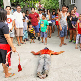 Magdarame devotees relive Christ's passion by carrying heavy crosses and flagellating themselves in San Fernando, Pampanga, during the Maleldo 2019, Holy Week Philippines, photo by Ivan Kralj