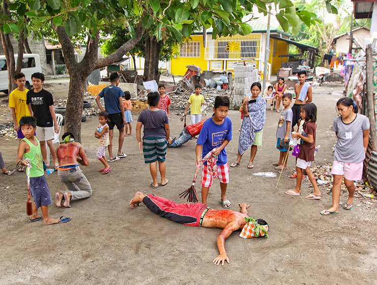 Magdarame devotees relive Christ's passion by carrying heavy crosses and flagellating themselves in San Fernando, Pampanga, during the Maleldo 2019, Holy Week Philippines, photo by Ivan Kralj