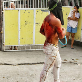 Magdarame devotees relive Christ's passion by carrying heavy crosses and flagellating themselves in San Fernando, Pampanga, during the Maleldo 2019, Holy Week Philippines, photo by Ivan Kralj