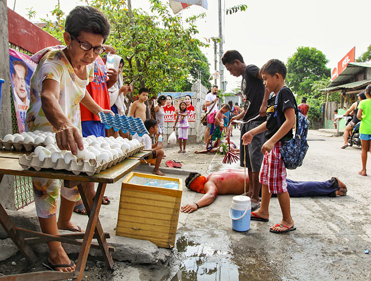 Magdarame devotees relive Christ's passion by carrying heavy crosses and flagellating themselves in San Fernando, Pampanga, during the Maleldo 2019, Holy Week Philippines, photo by Ivan Kralj