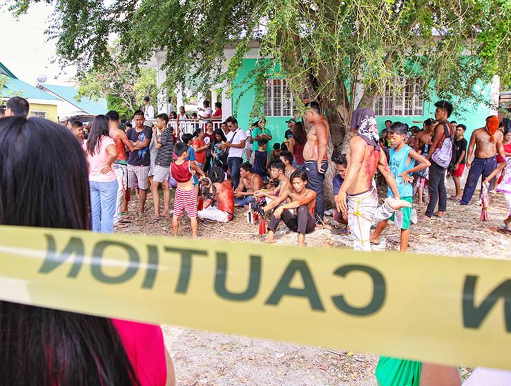 Magdarame devotees relive Christ's passion by carrying heavy crosses and flagellating themselves in San Fernando, Pampanga, during the Maleldo 2019, Holy Week Philippines, photo by Ivan Kralj