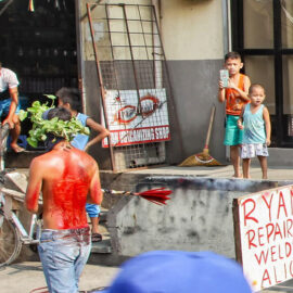 Magdarame devotees relive Christ's passion by carrying heavy crosses and flagellating themselves in San Fernando, Pampanga, during the Maleldo 2019, Holy Week Philippines, photo by Ivan Kralj