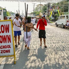 Magdarame devotees relive Christ's passion by carrying heavy crosses and flagellating themselves in San Fernando, Pampanga, during the Maleldo 2019, Holy Week Philippines, photo by Ivan Kralj